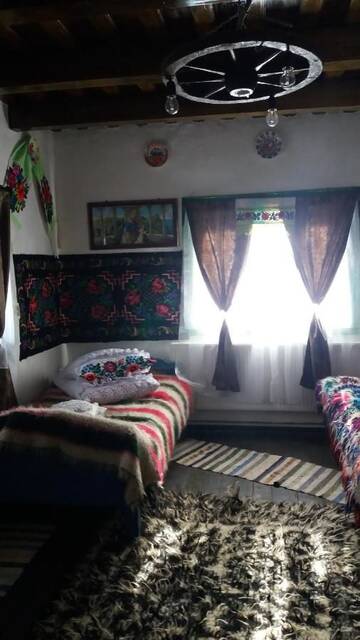 Фото номера Трехместный номер с ванной комнатой Проживание в семье Casuta Bunicilor г. Breb 5