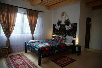 Фото номера Семейный номер Загородные дома Casa Maramureșeană Larisa г. Breb 5
