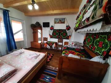 Фото номера Cемейный номер с собственной ванной комнатой Проживание в семье Casa Pintea de Sub Coastă г. Breb 4